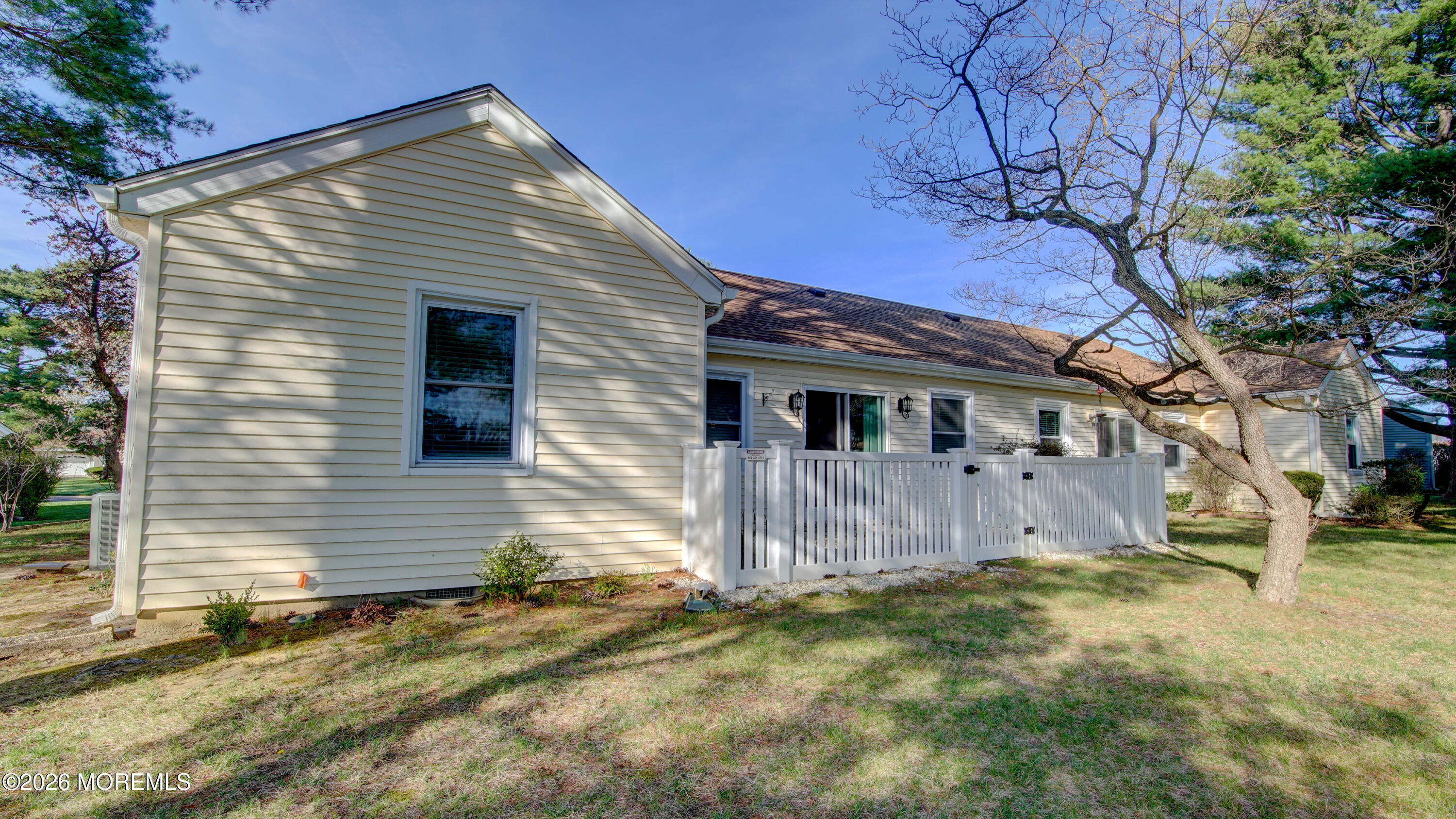 10 Zacatin Road, Unit B Freehold, NJ 07728 - Photo 38 of 39 a view of a house with a yard