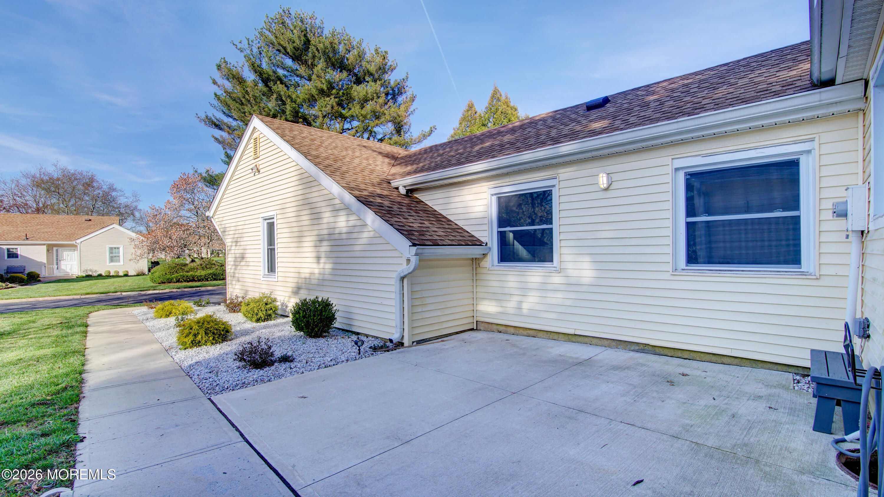 10 Zacatin Road, Unit B Freehold, NJ 07728 - Photo 4 of 39 a view of a house with a yard