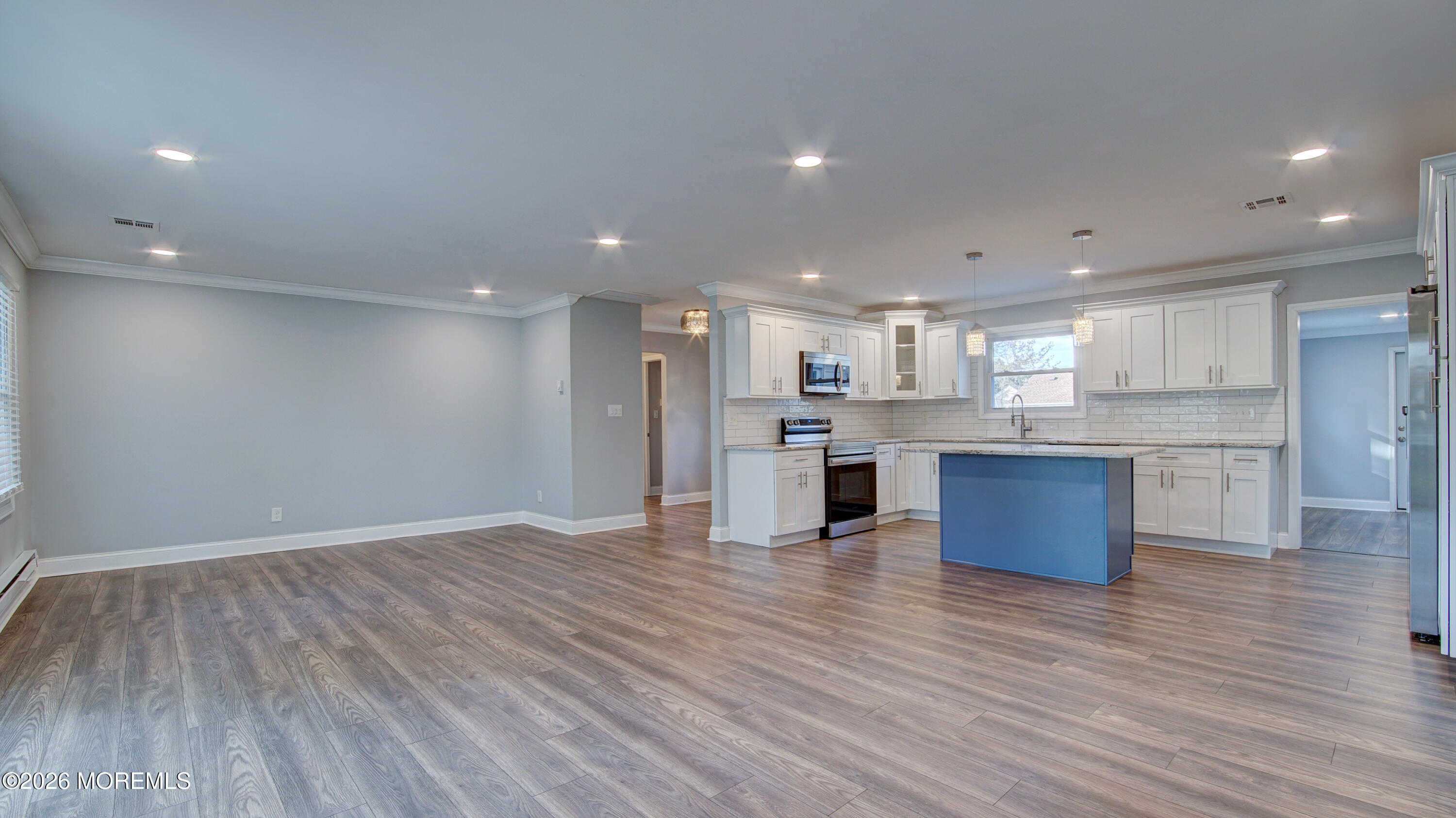 10 Zacatin Road, Unit B Freehold, NJ 07728 - Photo 7 of 39 a view of kitchen with wooden floor
