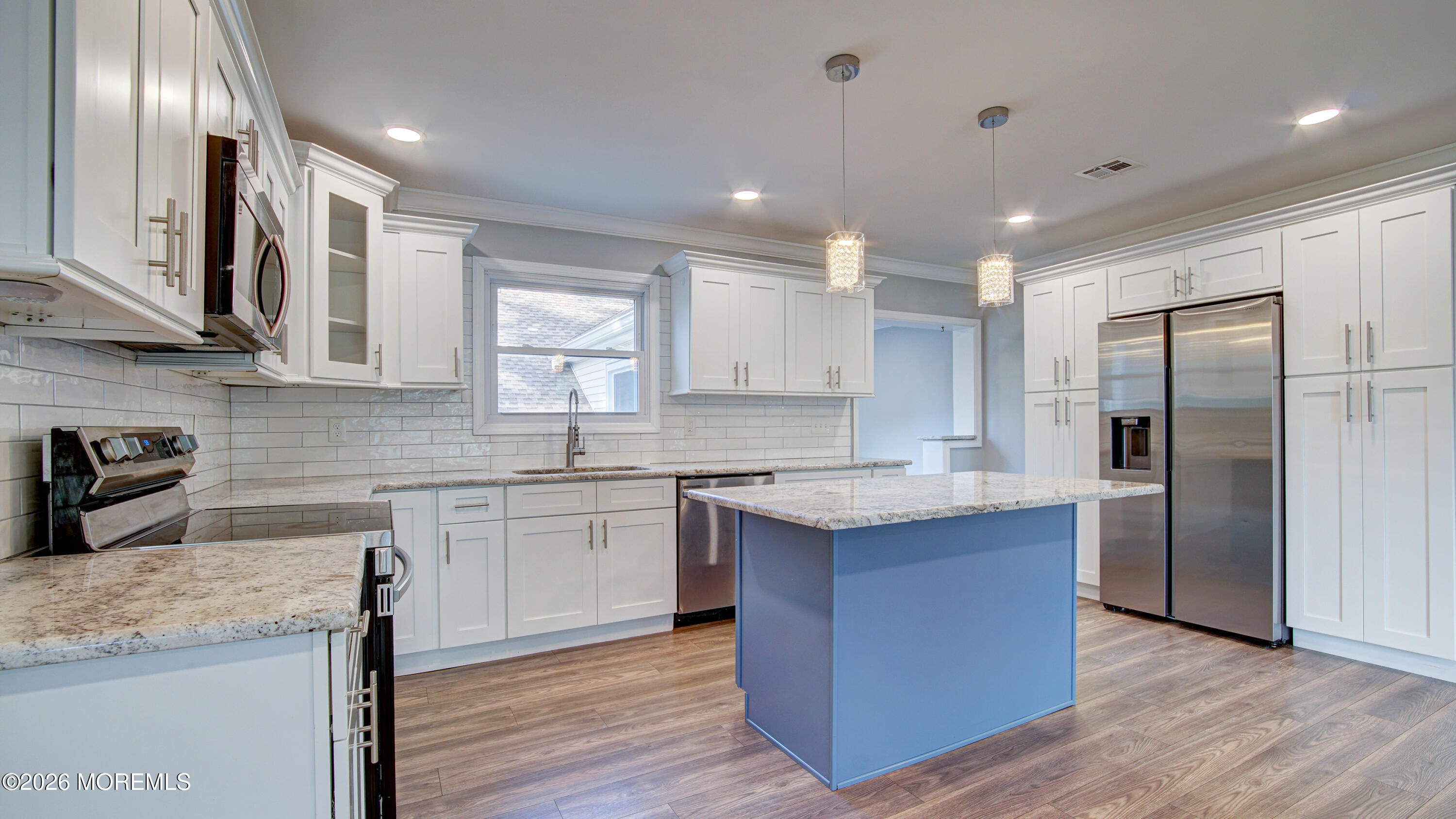 10 Zacatin Road, Unit B Freehold, NJ 07728 - Photo 9 of 39 a kitchen with a sink and cabinets