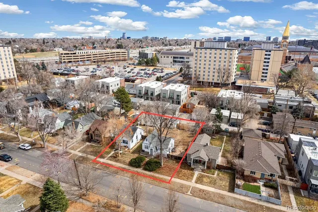 a view of a city with tall buildings