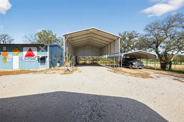 a view of swimming pool with outdoor seating