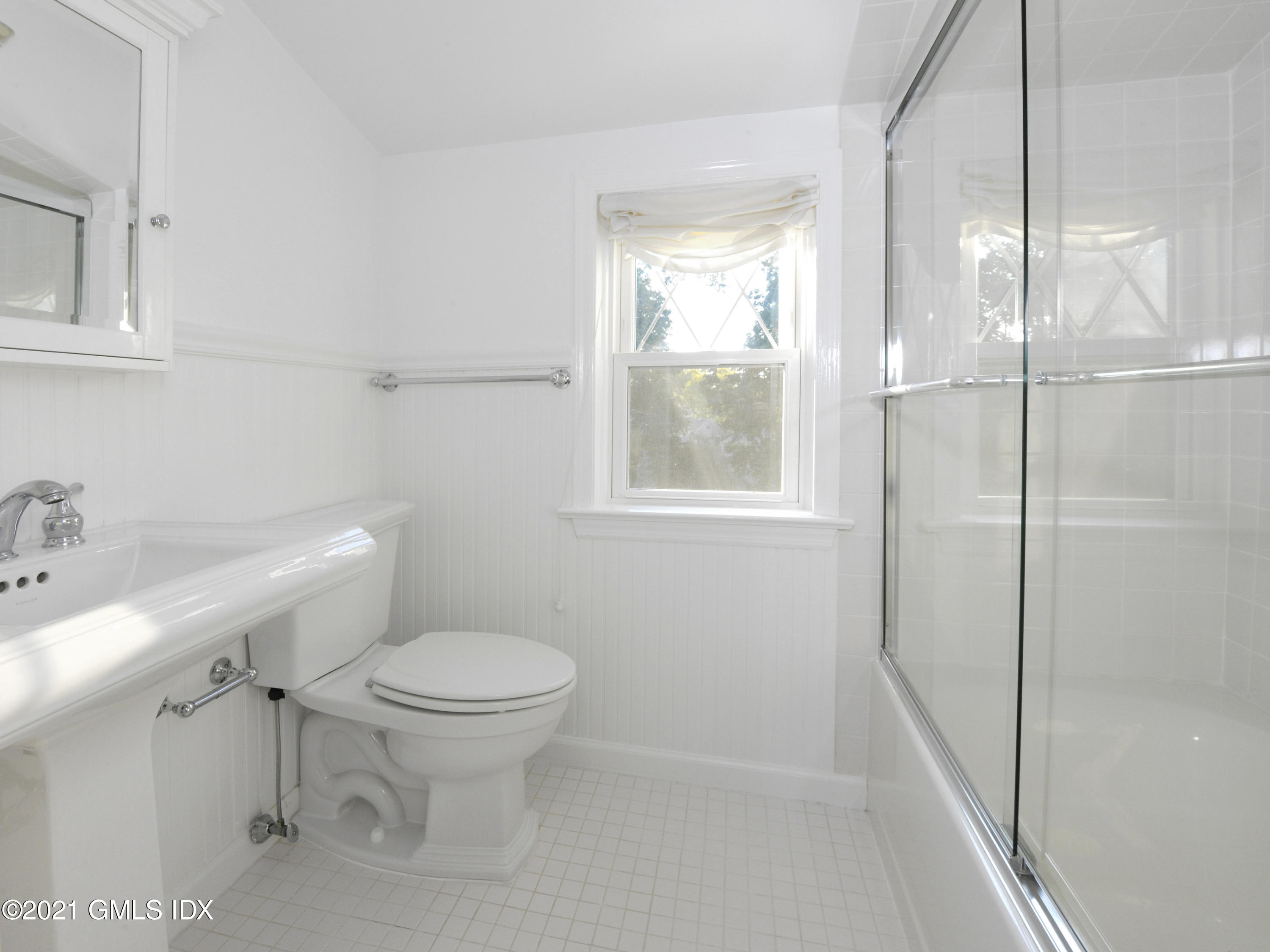 3 Random Road Old Greenwich, CT 06870 - Photo 20 of 28 a bathroom with a toilet sink and a shower