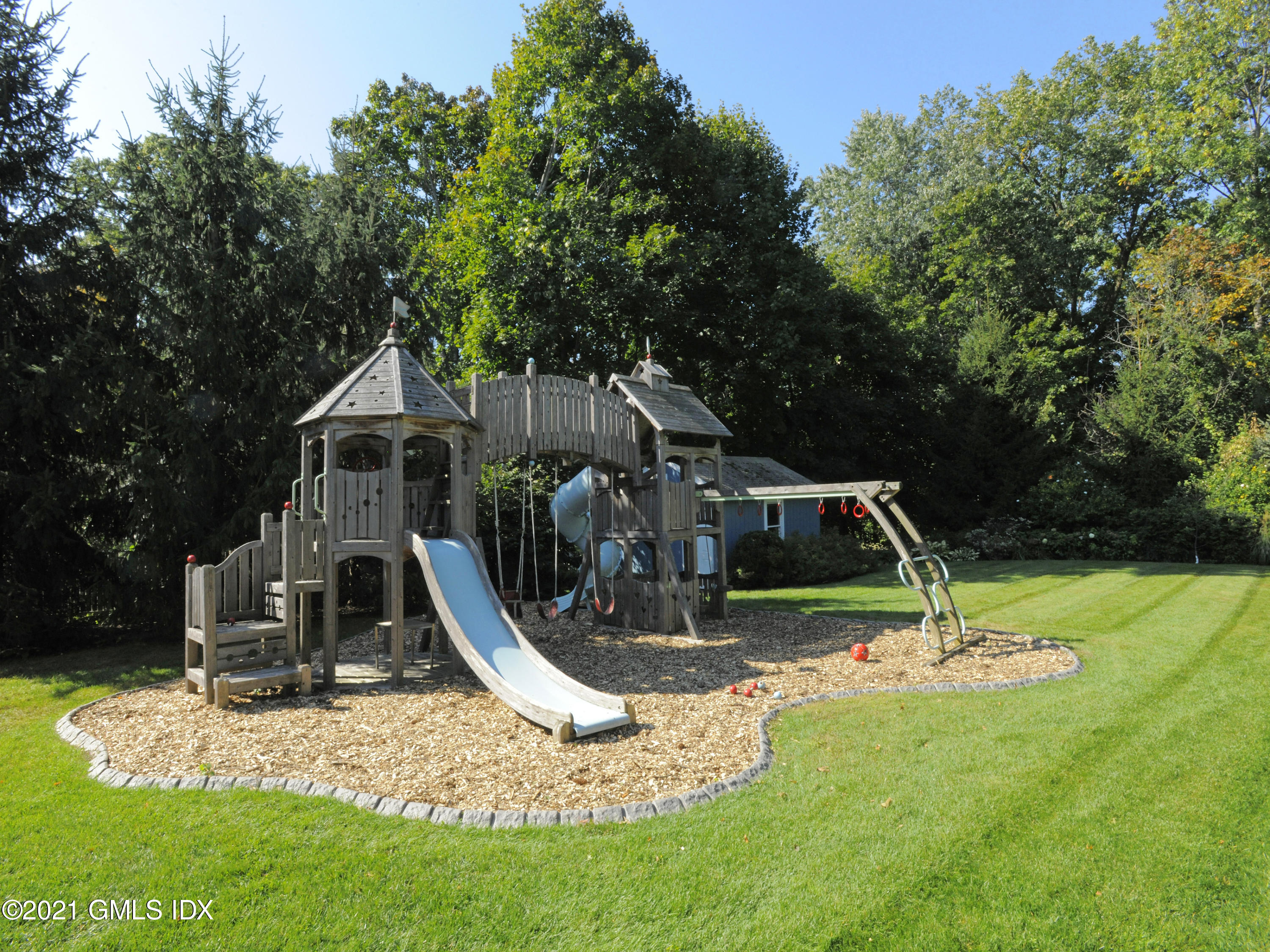 3 Random Road Old Greenwich, CT 06870 - Photo 24 of 28 a view of a park with slide