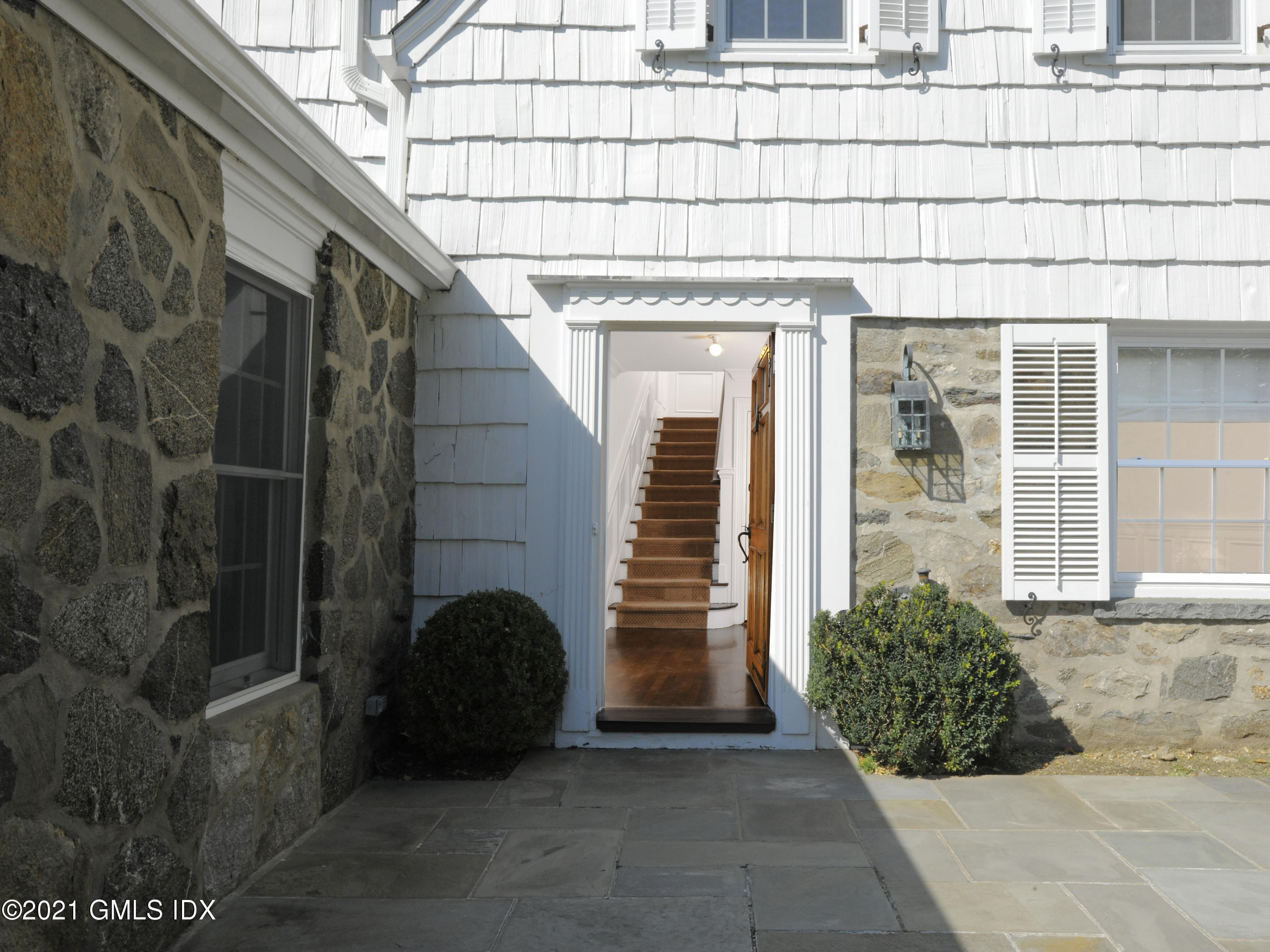 3 Random Road Old Greenwich, CT 06870 - Photo 3 of 28 a view of entryway with a brick wall