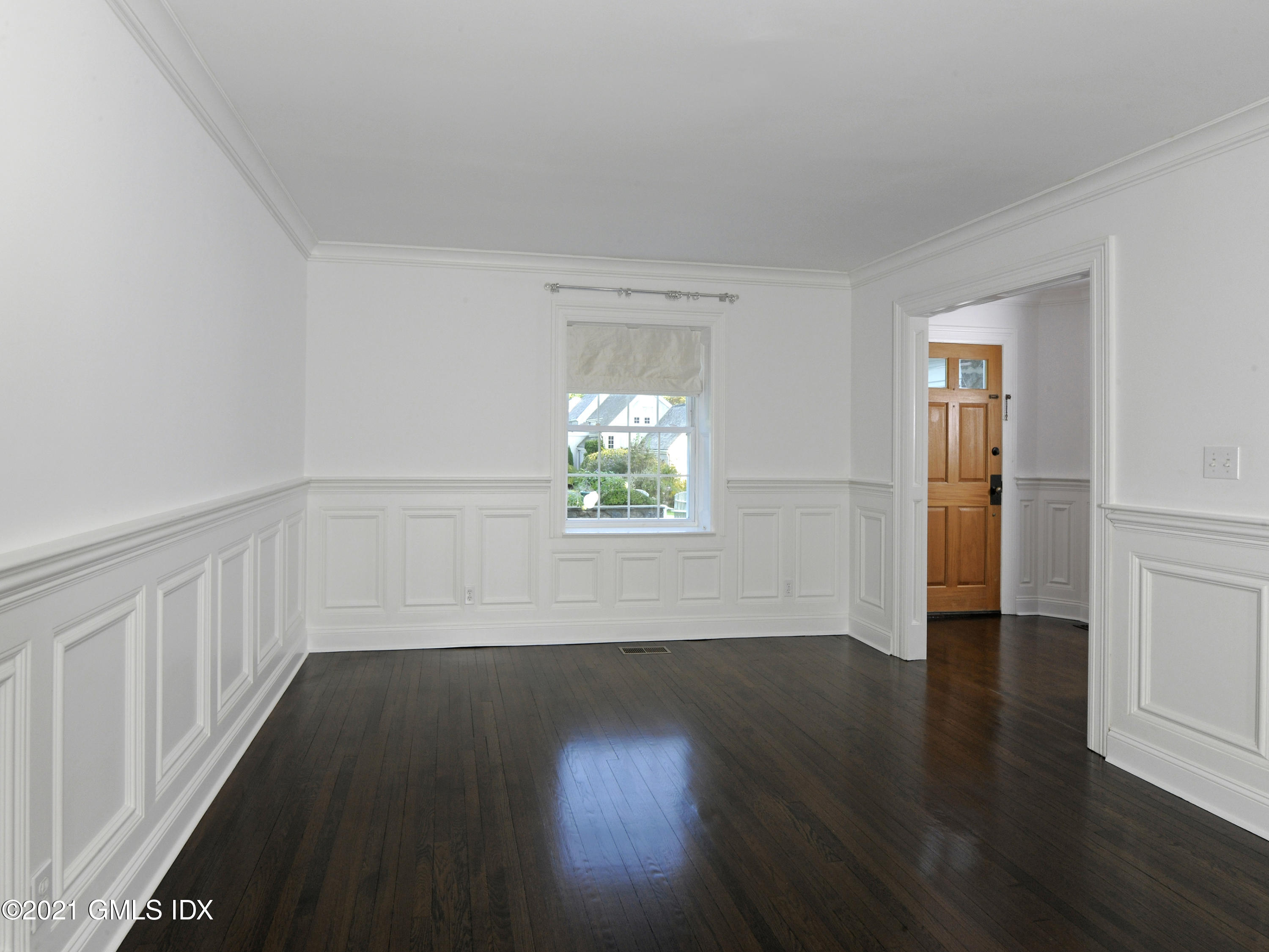 3 Random Road Old Greenwich, CT 06870 - Photo 6 of 28 an empty room with wooden floor and windows