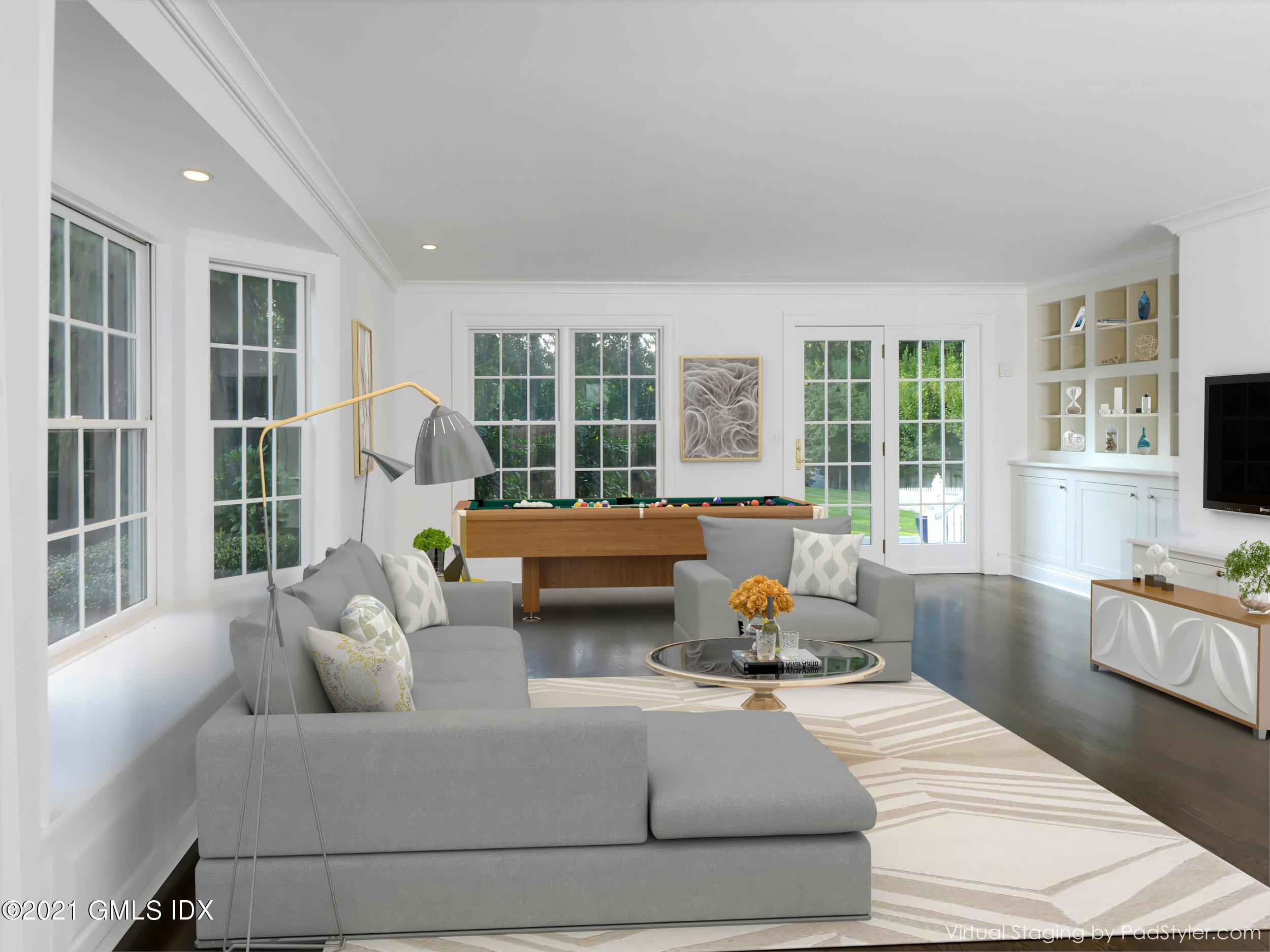 3 Random Road Old Greenwich, CT 06870 - Photo 10 of 28 a living room with furniture and floor to ceiling windows