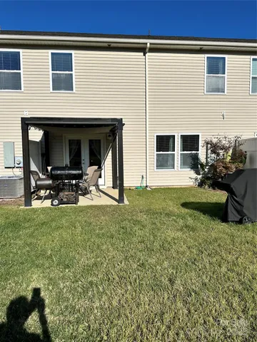 a house view with a garden space