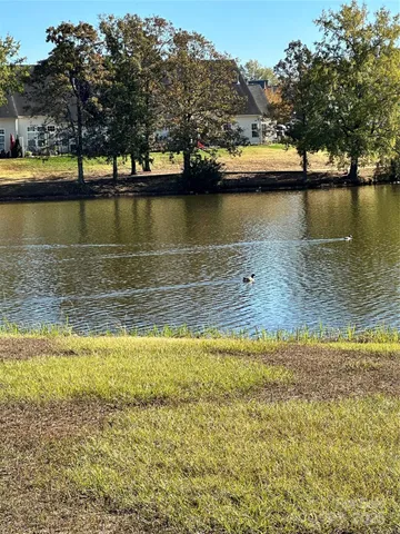 a view of a lake with houses