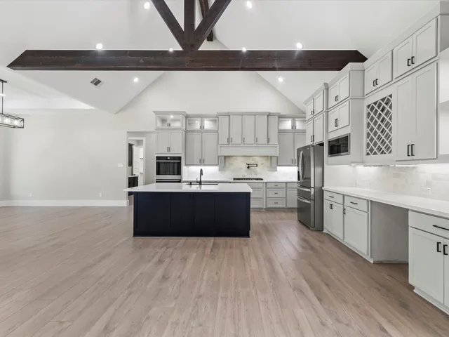 a bathroom with a sink and a shower