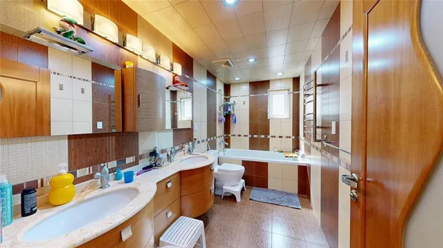 a view of a hallway with washer and dryer