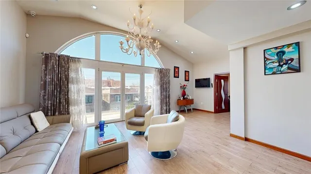 a living room with furniture and a table