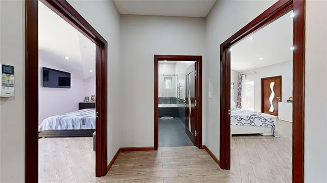 a lobby with furniture and potted plant