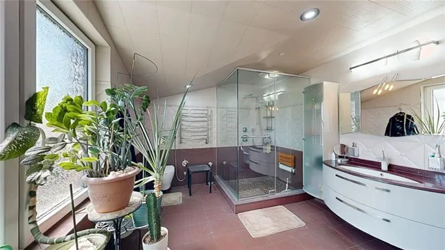 a view of a hallway with stairs