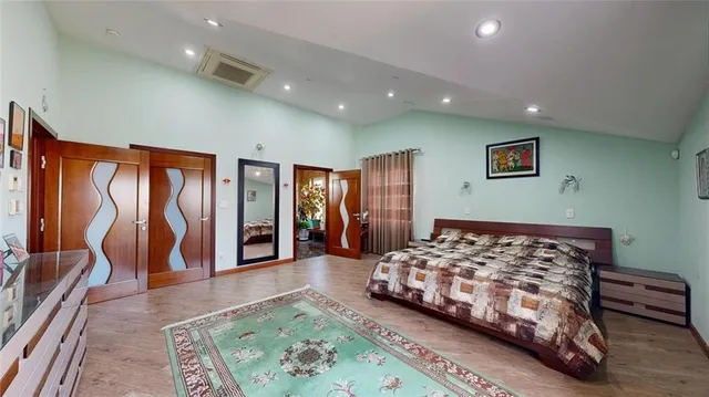 a bathroom with a shower and a sink