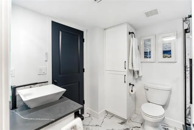 a view of a lake with a city