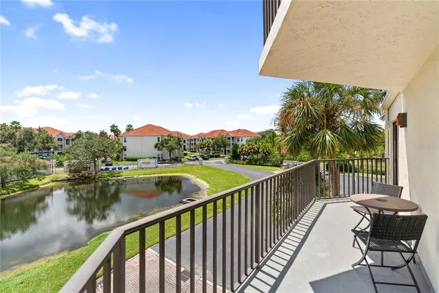 a view of parking garage with cars