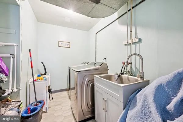 a bathroom with sink and mirror