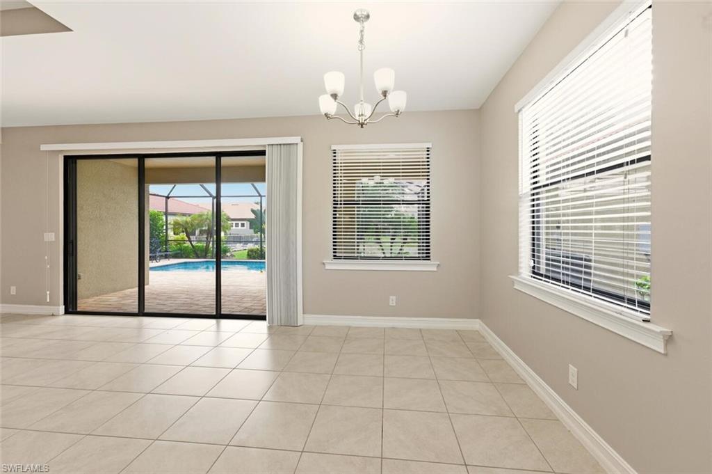 14513 Tuscany Pointe Trail Naples, FL 34120 - Photo 11 of 31 a view of an empty room with a window