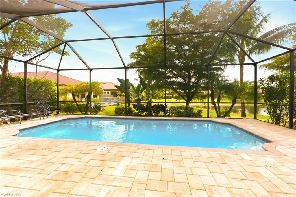 14513 Tuscany Pointe Trail Naples, FL 34120 - Photo 27 of 31 a view of a swimming pool and mountain view