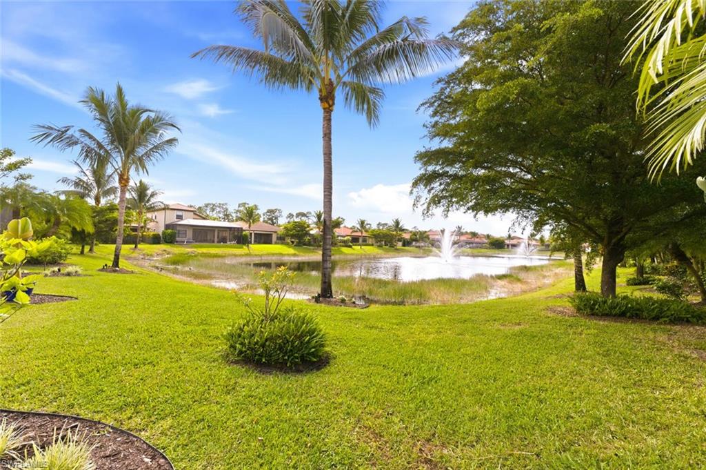 14513 Tuscany Pointe Trail Naples, FL 34120 - Photo 28 of 31 a view of an ocean beach and residential house