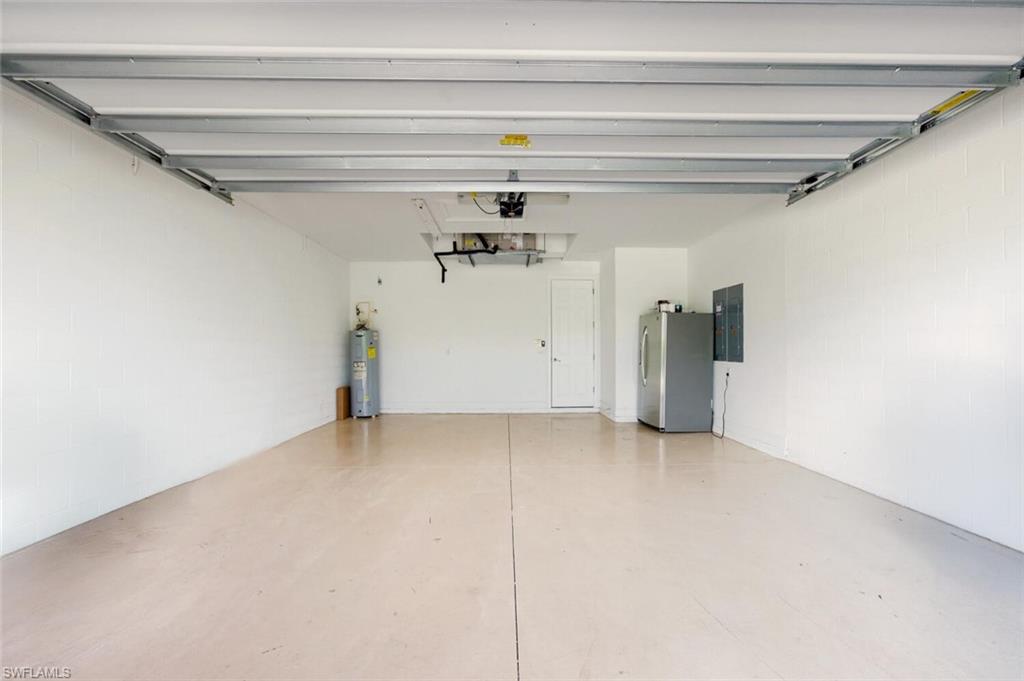 14513 Tuscany Pointe Trail Naples, FL 34120 - Photo 29 of 31 a view of a garage