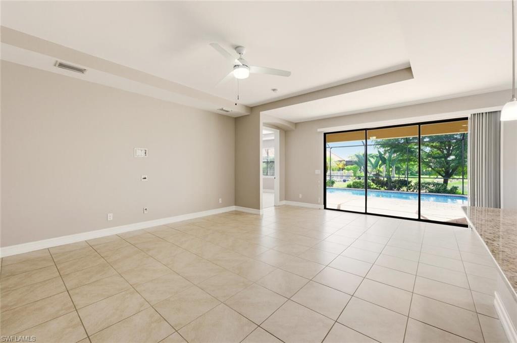 14513 Tuscany Pointe Trail Naples, FL 34120 - Photo 6 of 31 a view of an empty room with a window
