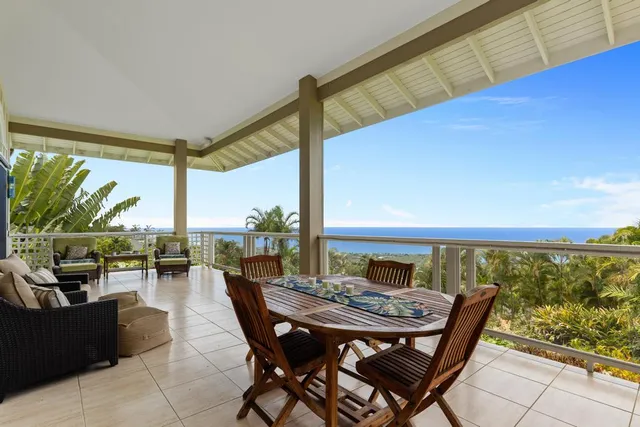a view of an outdoor space with furniture and outdoor view