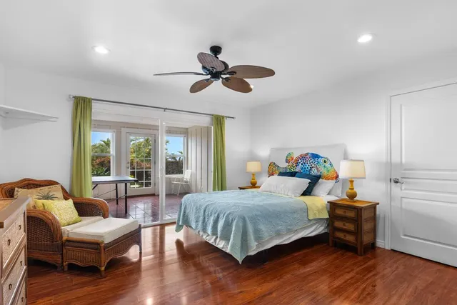 a bedroom with a bed and a couch