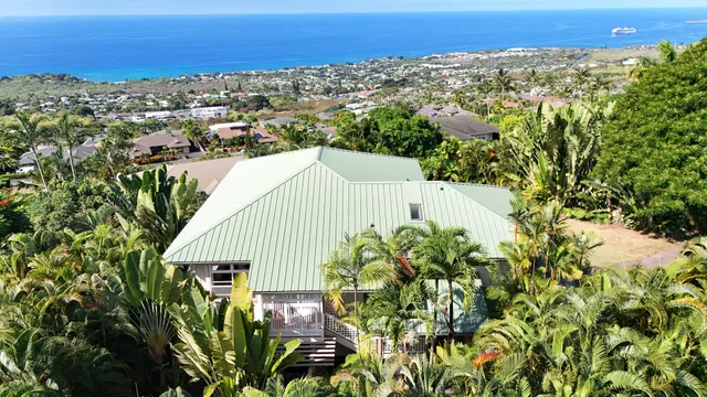 a view of a multi story residential apartment building and a mountain view
