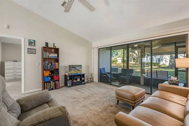 a kitchen with granite countertop a sink stainless steel appliances and cabinets