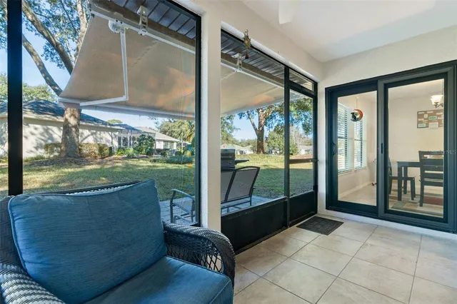a view of a house with swimming pool yard and sitting area