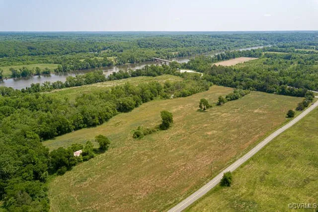 a view of a lake with a yard