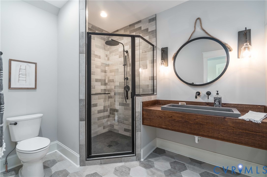 0 Perkinsville Road Maidens, VA 23102 - Photo 16 of 46 a bathroom with a toilet a sink and a mirror