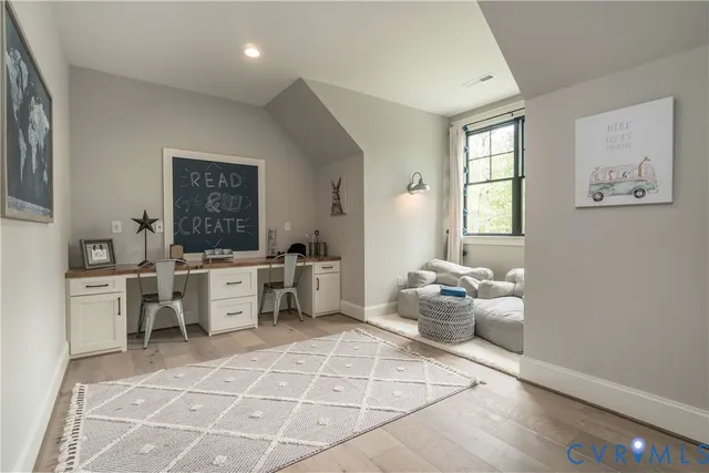 a bathroom with a toilet and a bathtub