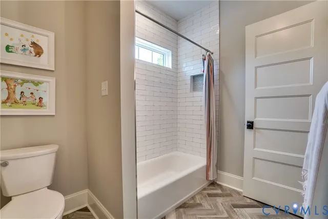 a spacious bathroom with double vanity sink and a mirror
