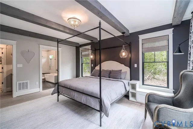 a spacious bathroom with a bathtub shower sink and mirror