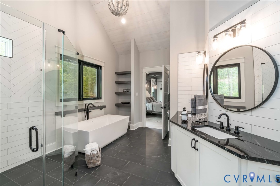 0 Perkinsville Road Maidens, VA 23102 - Photo 25 of 46 a en suite bathroom with a double vanity sink and a mirror
