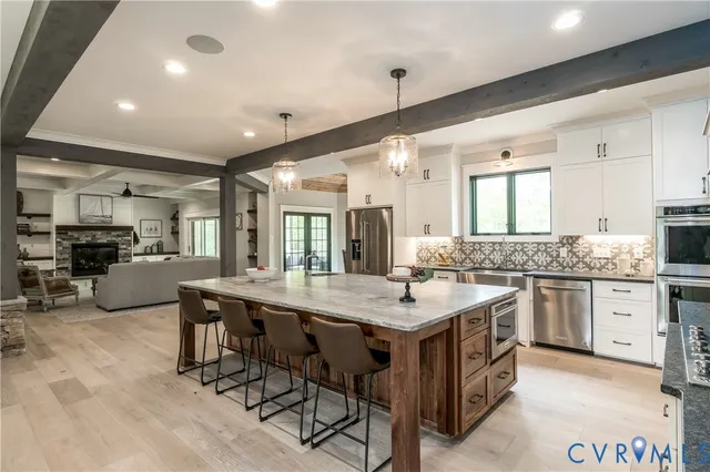 a kitchen with a stove and a sink
