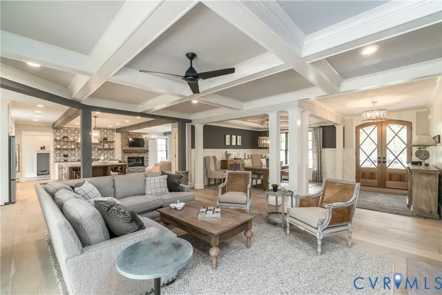 a large kitchen with a table and chairs