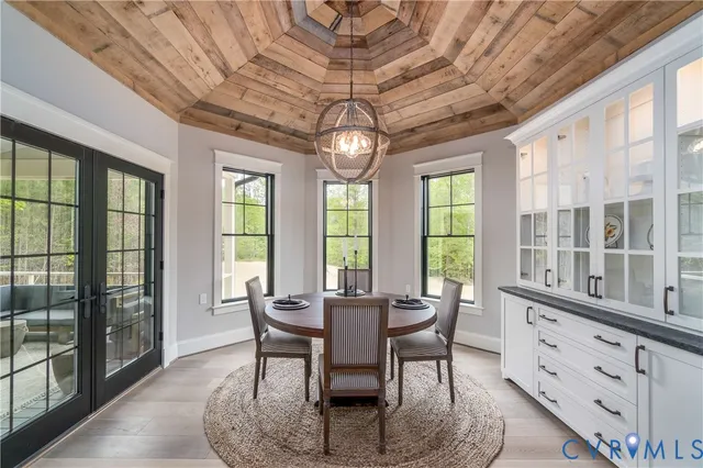 a kitchen with kitchen island a counter space and stainless steel appliances