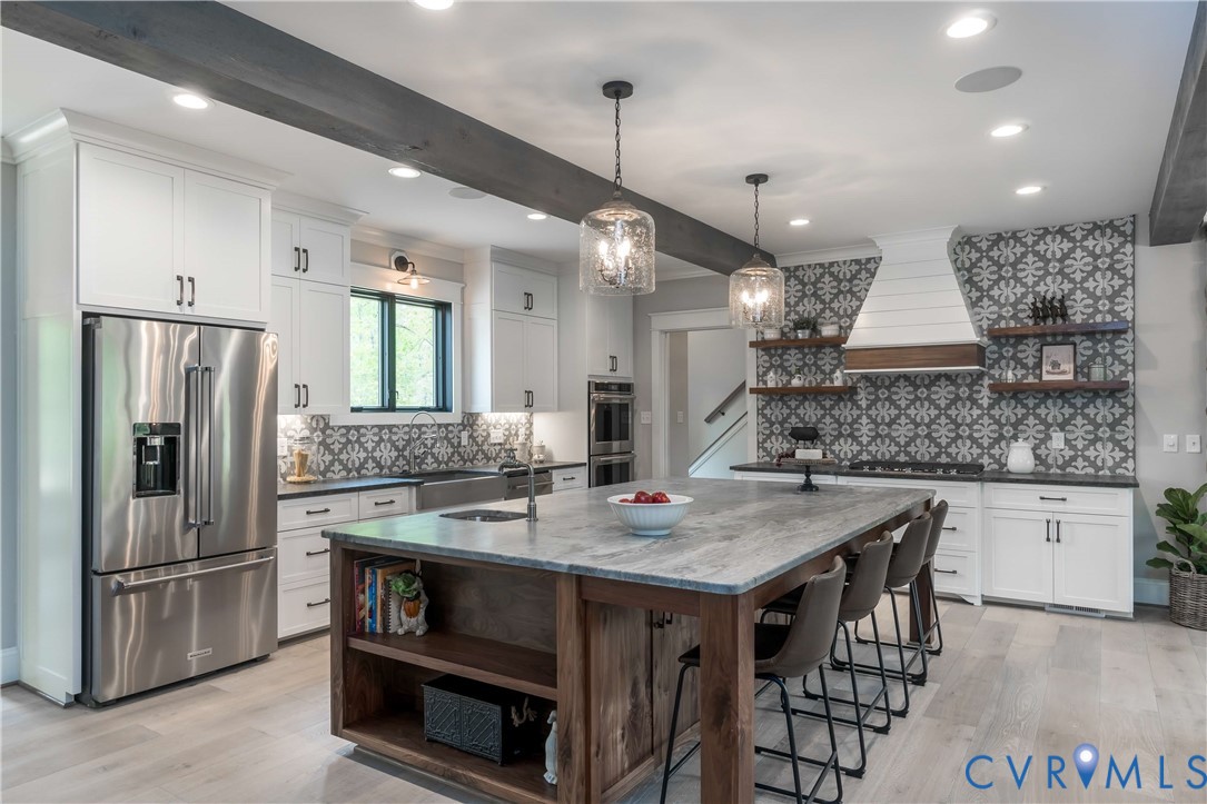 0 Perkinsville Road Maidens, VA 23102 - Photo 35 of 46 a kitchen with kitchen island a counter space and stainless steel appliances