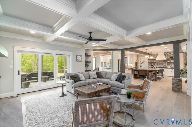 an aerial view of a house with yard swimming pool and outdoor seating