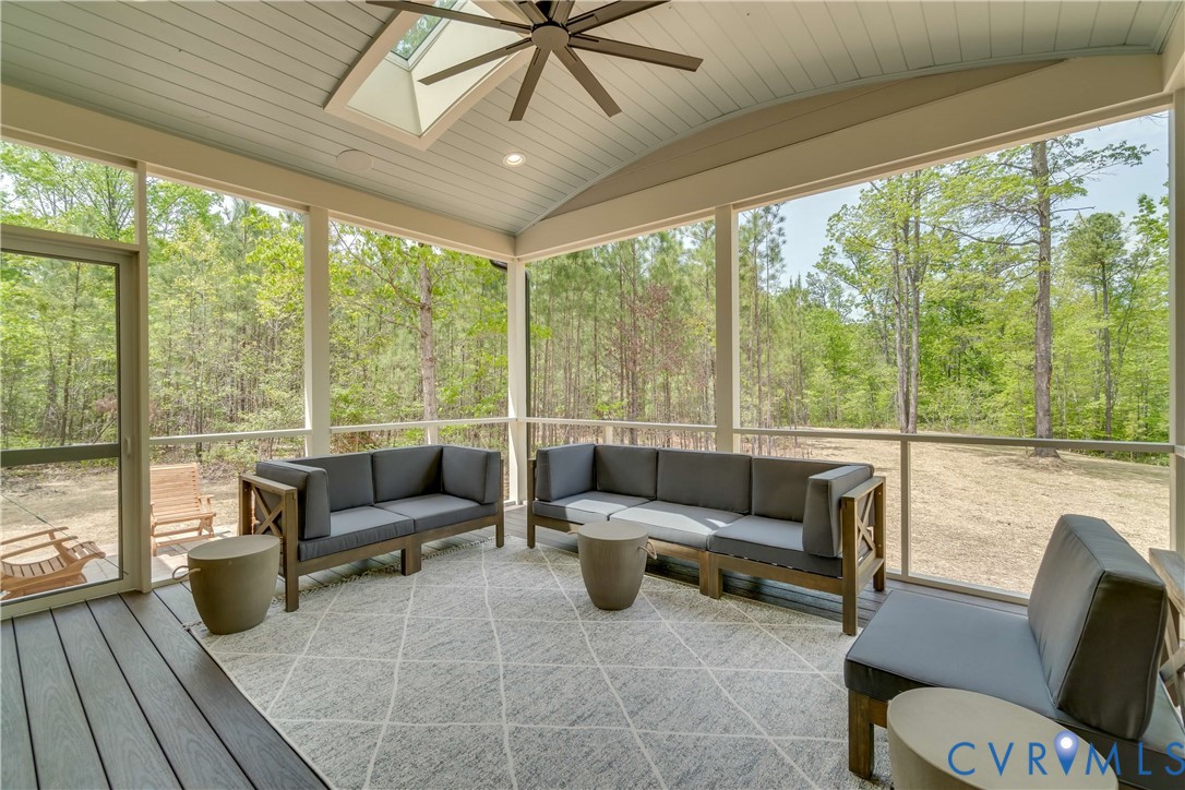 0 Perkinsville Road Maidens, VA 23102 - Photo 7 of 46 a living room with furniture and a floor to ceiling window