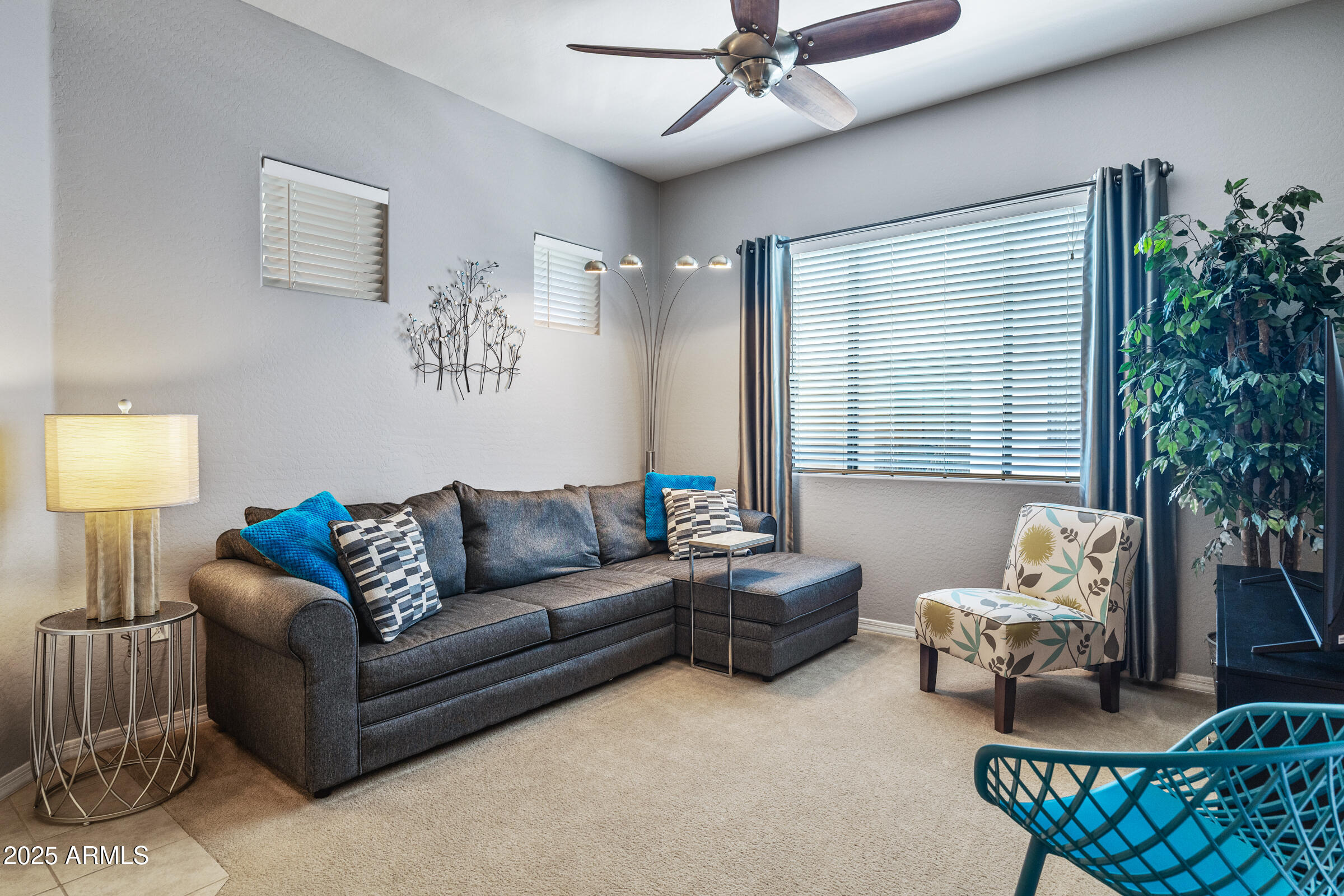 3330 South Gilbert Road, Unit 2013 Chandler, AZ 85286 - Photo 2 of 39 a living room with furniture and a window