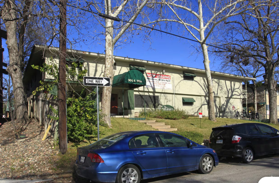 a car parked in front of a building