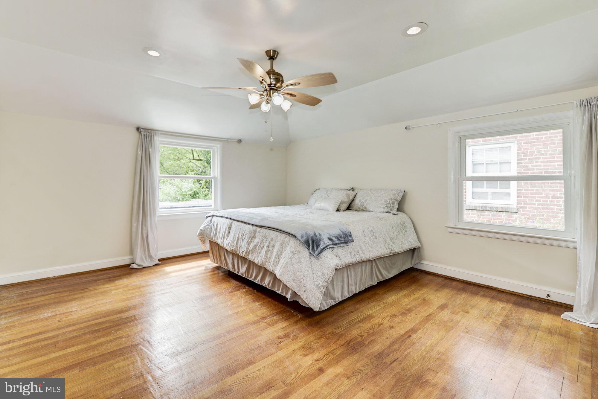 4300 Reno Road Northwest Washington, DC 20008 - Photo 11 of 22 a bedroom with a bed and a window