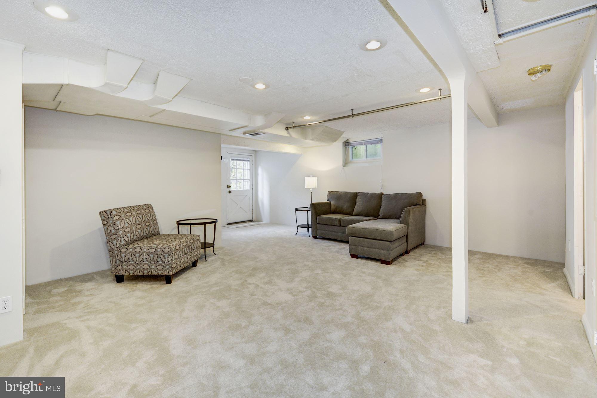 4300 Reno Road Northwest Washington, DC 20008 - Photo 16 of 22 a living room with furniture and a couch