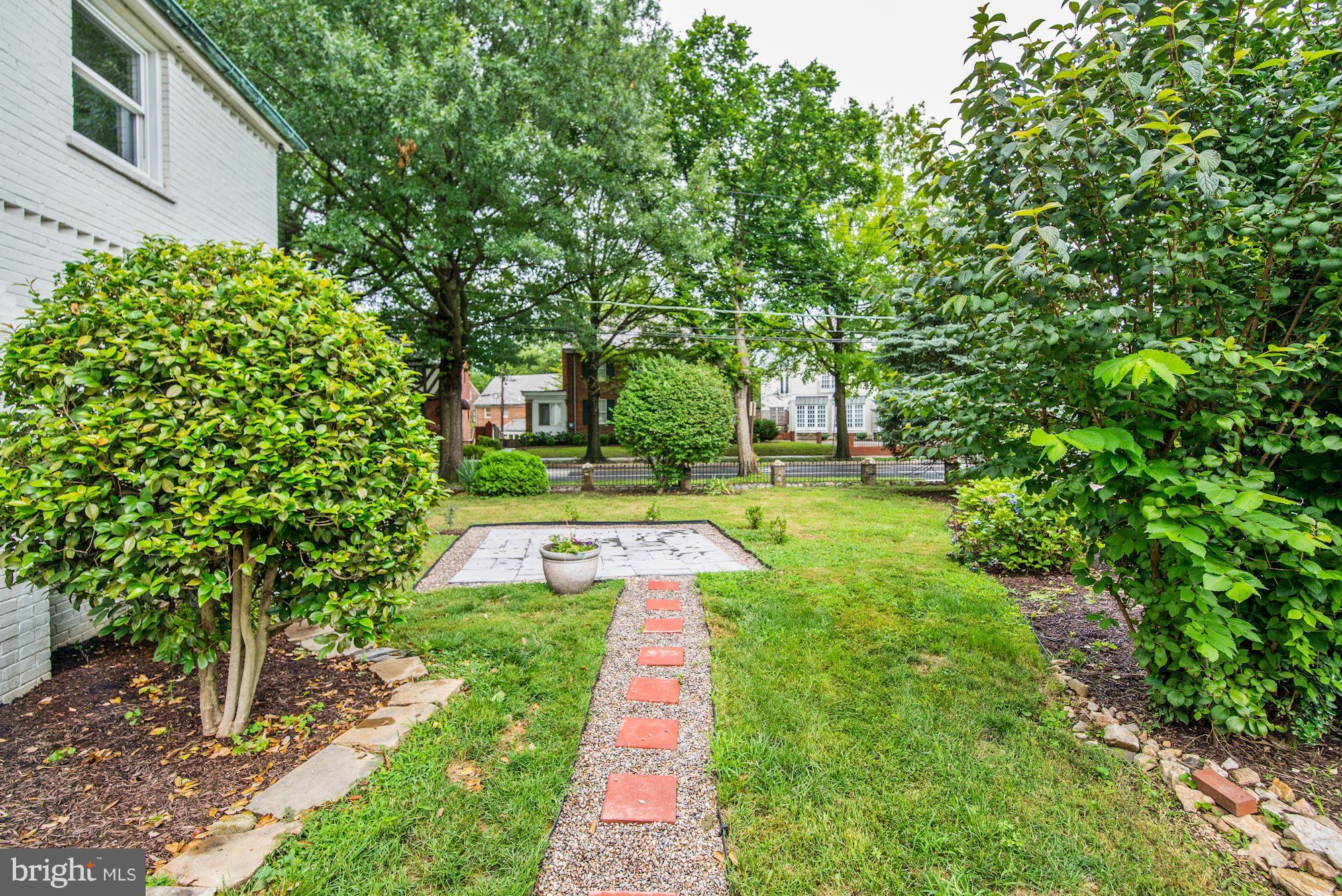 4300 Reno Road Northwest Washington, DC 20008 - Photo 19 of 22 a view of a backyard with swimming pool