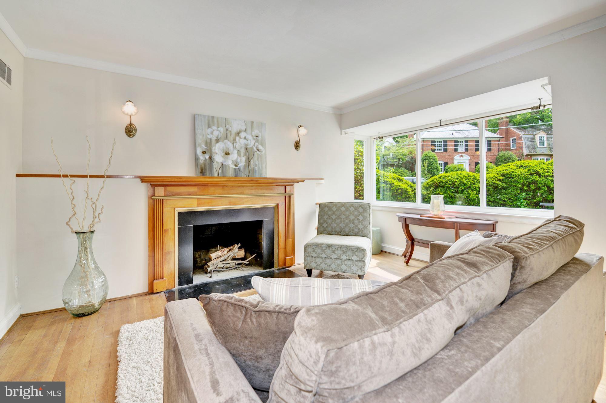 4300 Reno Road Northwest Washington, DC 20008 - Photo 3 of 22 a living room with furniture and a fireplace